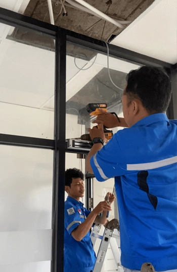Instalasi interlock door system area farmasi